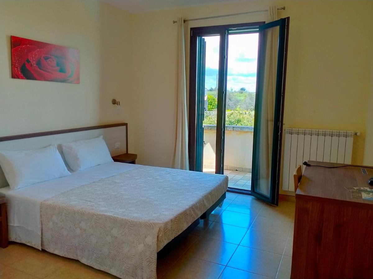 B&B Hotel Helios Uggiano La Chiesa Bagian luar foto
